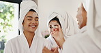 Happy, women and friends with face mask for skincare, cosmetics application and bonding together. People, laugh and help with facial, collagen treatment and dermatology benefits for reunion at hotel