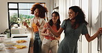 Dancing, drinks and girl friends in kitchen with fun, bonding or cooking dinner together in home. Happy, rhythm and group of women with music for preparing food for supper with wine in house.
