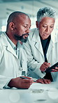 Science, meeting and scientist team on tablet in lab for medical research, results and feedback. Healthcare, pharmaceutical and people on tech for vaccine study, breakthrough or medicine discovery