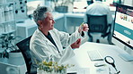Science, computer and woman with plant sample for medical research, natural vaccines and medicine. Healthcare, pharmaceutical and scientist in test tube for study, medicinal analysis and experiment