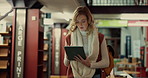Woman, tablet and walking in library, knowledge and online reading with social media. People, scholarship or students with tech, network or learning with digital app, email or college with connection