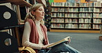 Girl, thinking or reading a book in library for exam preparation, study insight or test knowledge. University, gen z student or thoughtful on floor for research solution, thesis planning or education