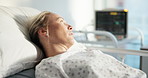 Thinking, hospital bed and woman with pain, healthcare and sick with cancer diagnosis. Person, contemplation and patient in clinic, thought and wonder with illness, anesthesia and tired with recovery