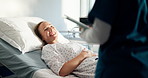 Woman, happy and nurse by hospital bed with tablet, report and listen for good news with healthcare. People, medical professional and patient with touchscreen, feedback or talk with results at clinic