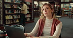 Laptop, thinking and woman student with notebook in library studying for university exam with textbooks. Education, computer and female person writing ideas with learning for college test on campus.