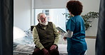 Nurse, healthcare and senior man in hospital, consultation and advice for joint injury. Pensioner, medical and elderly patient with professional, conversation and wellness with documents or support