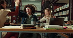 Celebration, high five and group of students in library with good marks, acceptance or scholarship. Happy, textbooks and friends studying together for university exam, test or assignment on campus.