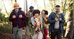 Hiking, group and friends with walking in forest for travel adventure, sightseeing and conversation. Backpacker, people and backpack in nature with holiday journey, fresh air and exploring together