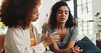 Woman, comfort and sad friend on couch for support, breakup and sympathy for depression. People, emotional and consoling person for relationship fail, cheating mistake and grief of breakdown at house