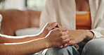 Friends, holding hands and consoling in home, trust and compassion for woman with grief and helping. House, care and patience for person in living room, empathy or understanding of trauma or kindness