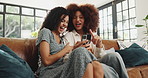 Mobile, women and friends laughing in home for gif, meme or show funny ai filter app on internet. Phone, living room and girls together for joke, conversation or watch video on social media to relax