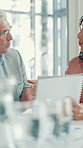 Business, man and talk with document in office for financial report, feedback or budget review. Mature person, team or discussion of finance pitch, investment project and information of profit growth