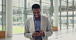 Office, black man and happiness with smartphone for walking, online chat and consultant for contact. Workplace, business person and male lawyer with mobile for application, social media and message