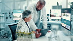 Scientist, talking and people on tablet in lab for medical research, experiment and botany. Mature team, digital and report for investigation, genetic change and information on ecology transformation