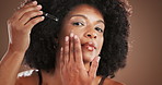 Studio, black woman and face with serum for skincare, wellness shine and anti aging with collagen. Portrait, female person and cosmetics with dropper for beauty, oil treatment and isolated background