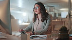 Night, business and woman with computer, glasses and online reading with research for article. Person, evening and journalist in workplace, pc and proofreading with email, internet and thinking