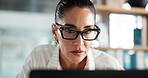 Doctor, woman and laptop with reading in clinic for medical journal, research or telehealth. Healthcare, report or thinking with document in hospital for administration, management or problem solving