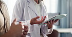 Tablet, doctor and consulting with people in office for healthcare advice, patient history and checkup. Digital records, medical diagnosis and help with person in clinic for symptoms survey and talk