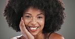 Face, beauty and black woman in studio, hair care and dermatology on grey background. African person, space and happy model with makeup, afro and skincare with shine, texture or volume with aesthetic