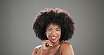 Face, beauty and black woman in studio, cosmetics and dermatology on grey background. African person, space and happy model with wellness, afro and skincare with shine, glow and makeup with aesthetic