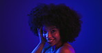 Happy, black woman and face with afro in studio, neon or night lights for beauty sensation. Portrait, female person or African model with smile or hairstyle for cosmetics, glow or shine on space