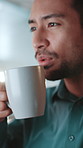 Drinking, business and man with coffee in office for work break, reading email and financial report. Male person, espresso beverage and reflection, budget review and information for finance proposal