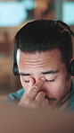 Office, businessman and laptop with headache for call center, sales mistake or pressure for deadline. Stress, male person and agent with pain for customer service fail, migraine and headset ay night