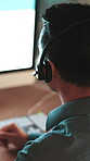 Back, man and screen of on computer for customer service chat, sales consulting and loan. FAQ, financial advisor or finance questions in call center with headset for solution, talk and banking limit