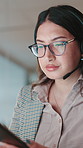 Call center, online and woman with smartphone, headset and   texting for communication with contact. Business, representative and person with mobile for telemarketing, consultation and chat for sales