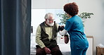 Nurse, old man and blood pressure test in hospital for healthcare checkup, hypertension and exam. Consultation, professional and monitor heart wellness of elderly patient for cardiovascular health