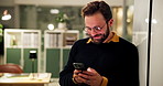 Typing, office and business man with smartphone for journalism, research or text online at night. Mobile, deadline and happy creative worker with news report, article feedback or publication approval