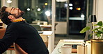 Tired, businessman and stretching with laptop at night for overtime or project deadline at office. Man, employee or working late with stress on computer desk for pressure or bad posture at workplace