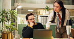 Accounting, conversation and laptop with business people in office at night for financial report. Computer, collaboration and finance with accountant team at desk in workplace for wealth management