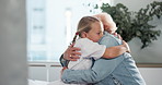 Hug, medical or support with girl and granny in hospital together for bonding, empathy or love. Comfort, healthcare and visit with grandchild embracing senior woman on bed in clinic for recovery