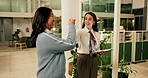 Fist bump, tablet and business women at night for online review, project and website research. Creative office, collaboration and workers on digital tech for success on report, meeting and discussion
