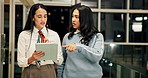 Walking, tablet and business women at night for online review, project and website research. Creative office, collaboration and workers on digital tech for copywriting report, meeting and discussion