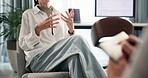 Patient, hands and therapist in consultation for mental health, discussion and recovery support for anxiety. Therapy, psychologist and person on sofa for counseling, share trauma, notes in session