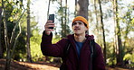 Man, hiking and phone with bad signal in forest for poor reception or network service in nature. Male person, hiker or lost with mobile smartphone for navigation error, app or path finding in woods