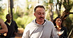 Fitness, man and group running in forest for marathon challenge, endurance or pace training. Cardio club, people or jog together in woods for competition, exercise or wellness workout for performance