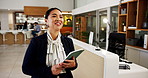 Smile, tablet and walking with hotel concierge in lobby for accommodation, planning or reservation. App, booking and hospitality with happy Asian woman at work in reception for resort management