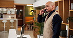 Phone call, man and receptionist at front desk in hotel for booking reservation or view appointment. Hospitality, customer care and male concierge with communication for room service at accommodation