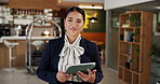 Hospitality, tablet and walking with hotel concierge in lobby for accommodation, planning or reservation. App, booking and smile  with happy Asian woman at work in reception for resort management