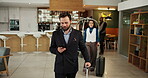 Hotel, businessman and luggage with smartphone for walking, professional communication and check in. Travel, person and guest with mobile for online booking, accommodation and arriving with suitcase
