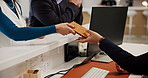 Hands, hotel receptionist or guests with passport for check in, assistance or concierge service. Hospitality industry, people or tourists with arrival for reservation, holiday booking or confirmation