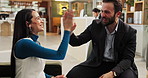 Business, people and meeting with high five at hotel for good news, success and collaboration. Staff, tablet and fist bump of online contract deal, team achievement and celebration for project winner