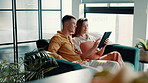 Couple, relax and scroll with tablet on sofa for online shopping, app choice or purchase decision. Happy, people or bonding together with digital tech in home for social browsing or streaming service