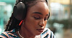 Radio host, woman and headphones in studio with podcast research, networking and news announcement. Streaming, black person and happy with talk show insight, on air preparation or ready for broadcast