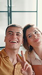 Selfie, happy and couple on sofa with peace sign for social media, online post and profile picture. Love, dating and man with woman take photo with emoji for bonding, fun and relax in living room