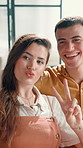 Selfie, happy and couple in home with peace sign for social media, online post and profile picture. Love, dating and man with woman take photo with emoji for bonding, fun and relax in living room