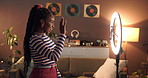 Phone, ring light and wave with black woman in home for influencer, promotion or smile. Social media content creator and recording with person and live streaming for vlog broadcast or follower advice